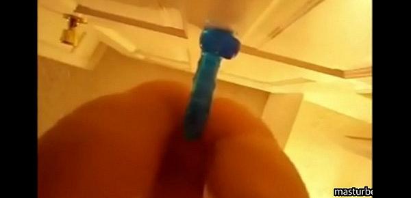  Alexis 19 fucks blue dildo mounted on door and squirts